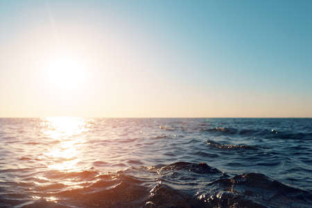 Dark blue sea waves on the sunset