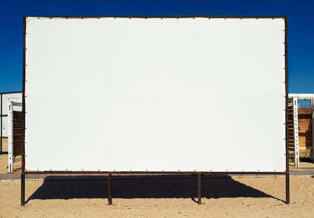 Empty blank billboard on the beach close upの写真素材