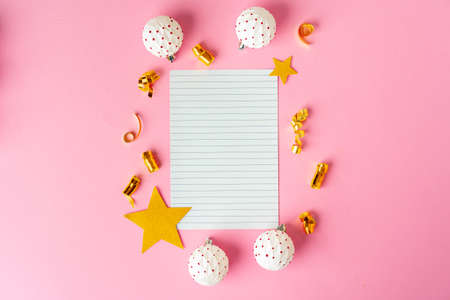 Blank sheet of paper with golden decorative stars. New year resolutions conceptの写真素材