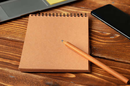 Open laptop with blank notebook, view from above. Workplace concept