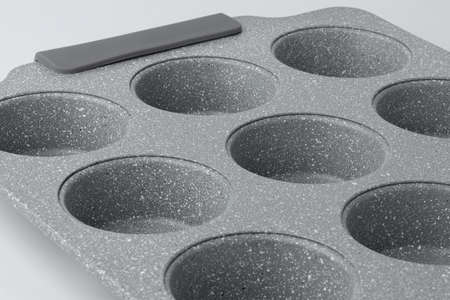 New ceramic baking dish isolated on whiteの写真素材