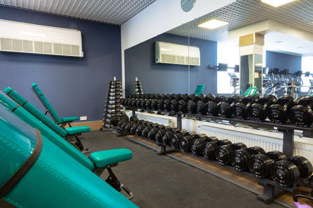 New sports equipment in a gym, nobody