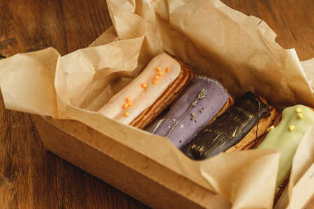 Group of colorful eclair cakes close up