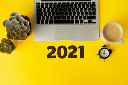Office supplies and 2021 numbers. New year business goals and plans conceptの写真素材
