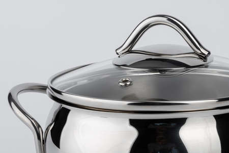 New metal cooking pot isolated on whiteの写真素材
