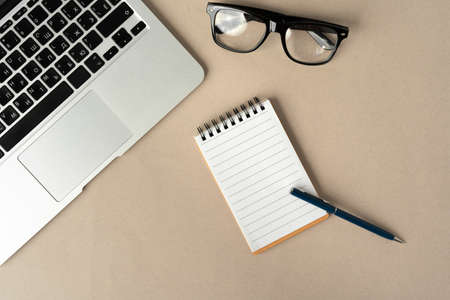 Open laptop with blank notebook, view from above. Workplace conceptの写真素材