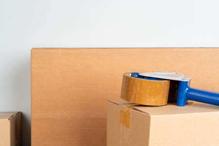 Close up photo of a stack of moving boxesの写真素材