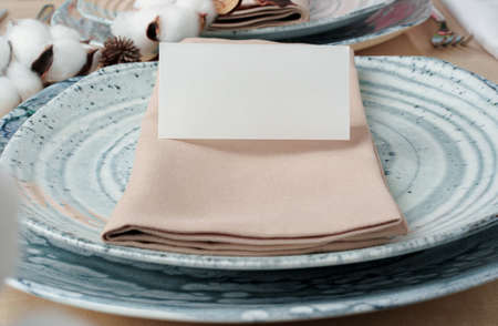 Beautiful table setting decorated with cotton buds