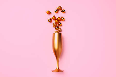 Champagne glass with Christmas balls flat layの写真素材