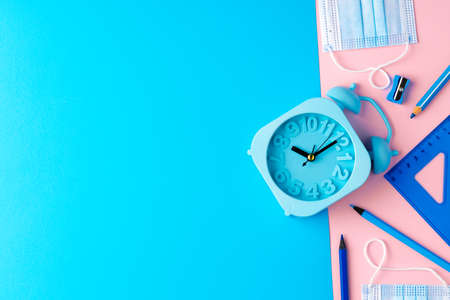 School stationery items and medical face mask