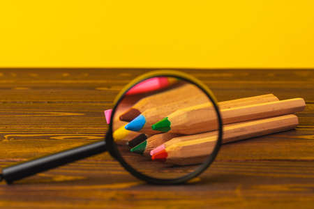 Color pencils on wooden table close upの写真素材