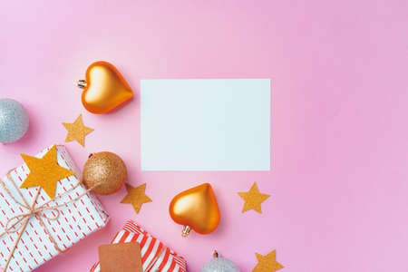 Christmas festive decorations with copy space on pink background