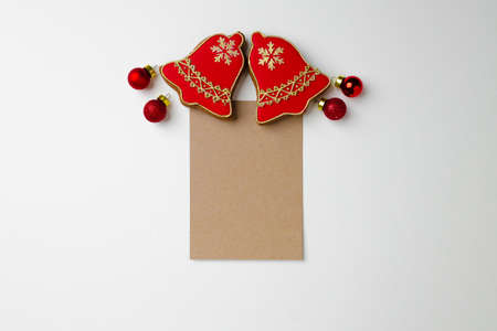 Blank paper and gingerbread Christmas cookie top view