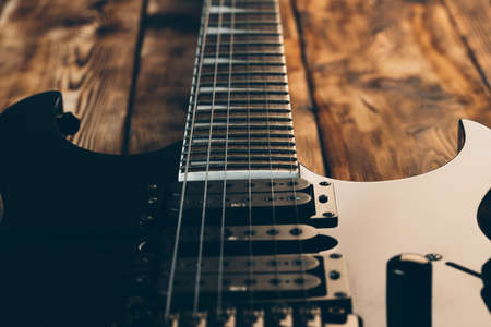 Close up photo of electric guitar fingerboard