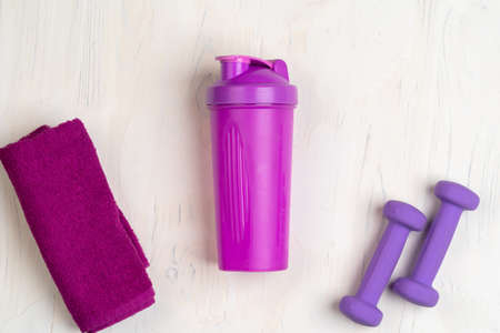 Small dumbbells, shaker and towel. Fitness conceptの写真素材
