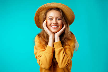 Portrait of a young beautiful happy woman smilingの写真素材