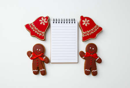 Christmas greeting card or letter to Santa with gingerbread biscuit