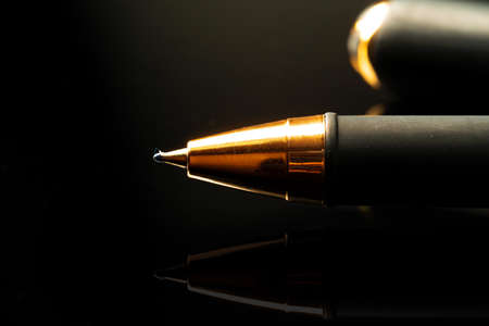 Close up of a pen on black backgroundの写真素材
