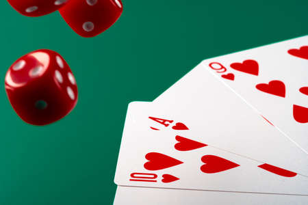 Playing cards with red dice. Casino and gambling concept
