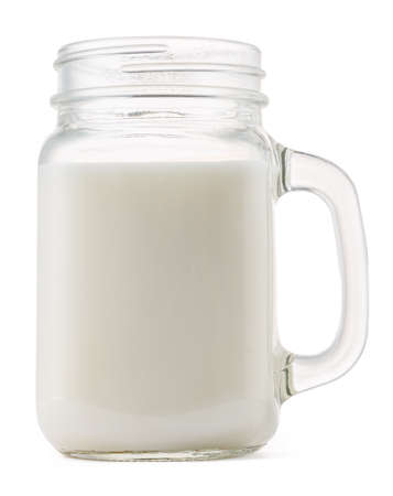 Glass of milk isolated on white backgroundの写真素材