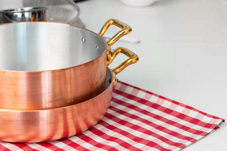 Kitchen utensils on a modern home kitchen table topの写真素材
