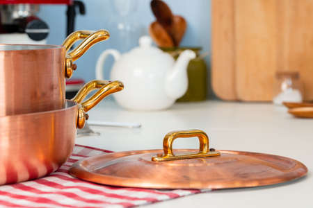 Kitchen utensils on a modern home kitchen table top