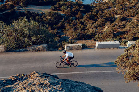 Cyclist riding on his bicycle at coastal road