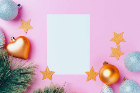 Christmas festive decorations with copy space on pink backgroundの写真素材