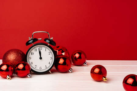 Christmas and New Year countdown concept with alarm clockの写真素材