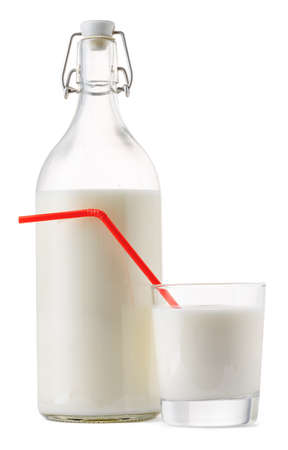 Glass bottle and cup of fresh milk isolatedの写真素材