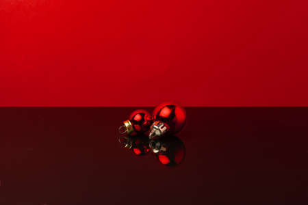 Background with a bunch of red shiny Christmas baublesの写真素材
