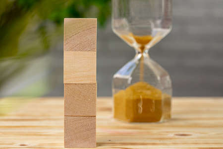 Blank wooden cubes with copy space for your design on office working table