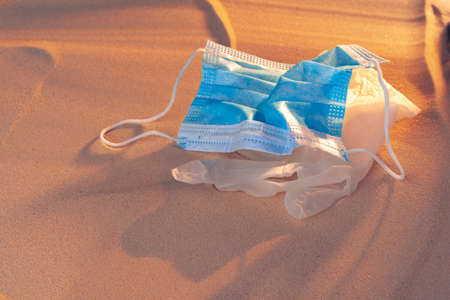 Protective facial mask on the natural outdoors beach background