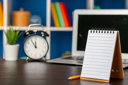 Blank open notepad with copy space on office tableの写真素材