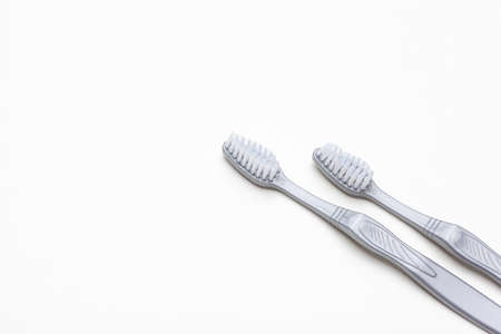 Flat lay composition with manual toothbrushes on color background, close up