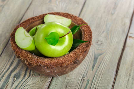 green apple on wooden background. High quality photoの写真素材