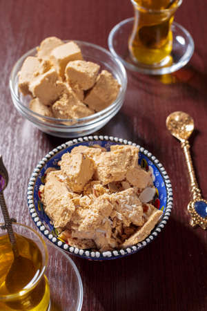 Tasty halva with tea on the table