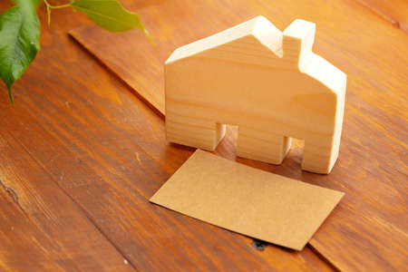 Little toy house model carved from woodの写真素材