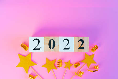 New Year 2022 concept on pink backgroundの写真素材