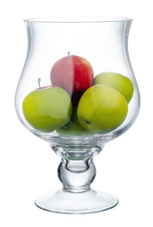 Glass bowl for fruits storage isolated on whiteの写真素材