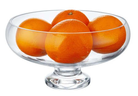 Glass bowl for fruits storage isolated on whiteの写真素材