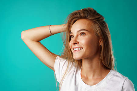 Portrait of a young beautiful happy woman smilingの写真素材