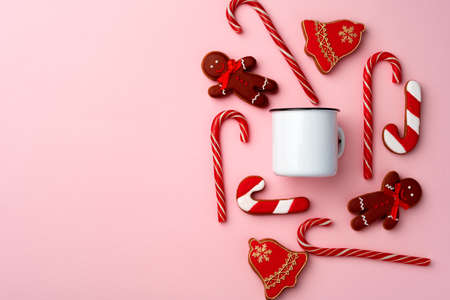 Christmas gingerbread cookies on pink background top viewの写真素材