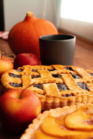 Close up of homemade traditional sweet autumn raspberry tart pie on wooden tableの写真素材