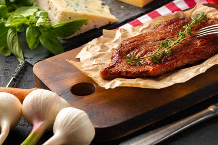 Grilled beef steak served on plate close upの写真素材