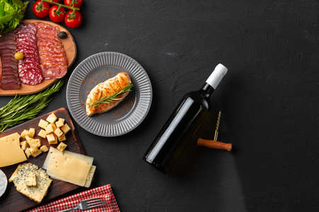 Grilled chicken breast served on black tableの写真素材