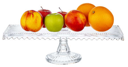 Glass bowl for fruits storage isolated on white