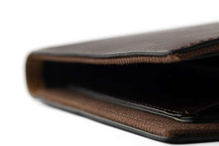 Brown shiny wallet isolated on white background