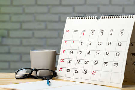 Calendar page close up on office deskの写真素材