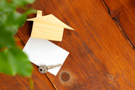 Wooden house model miniature and house keysの写真素材